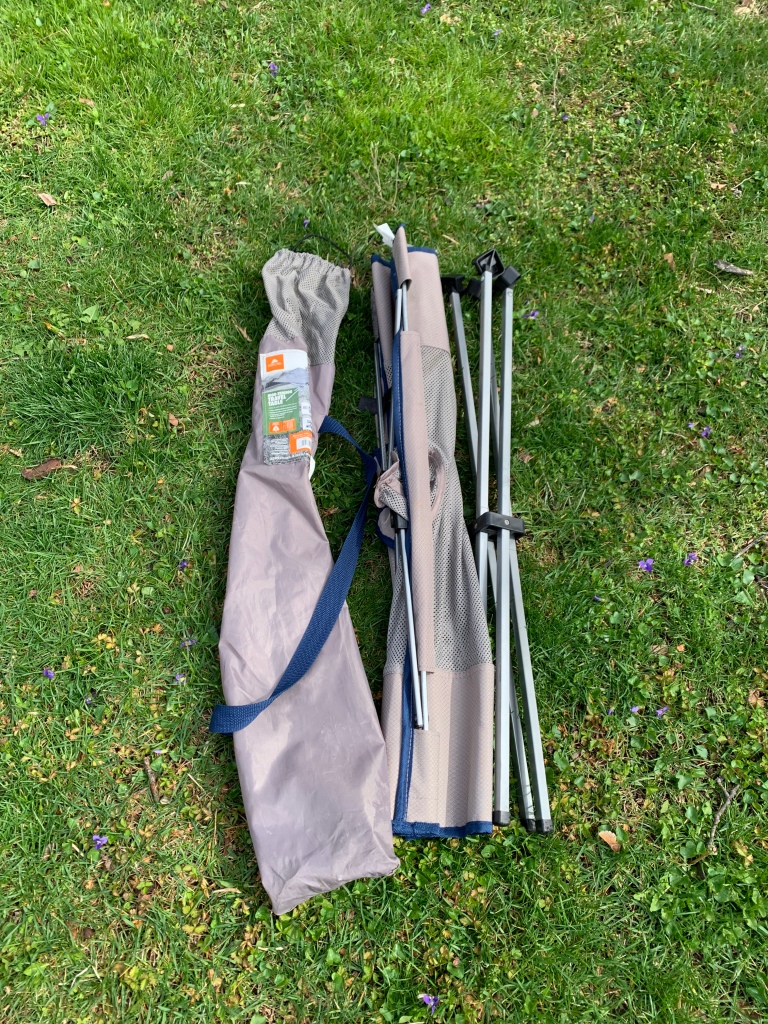 The Ozark Trail Folding Camping Table Has 2 Pieces (Base and table top) and a bag